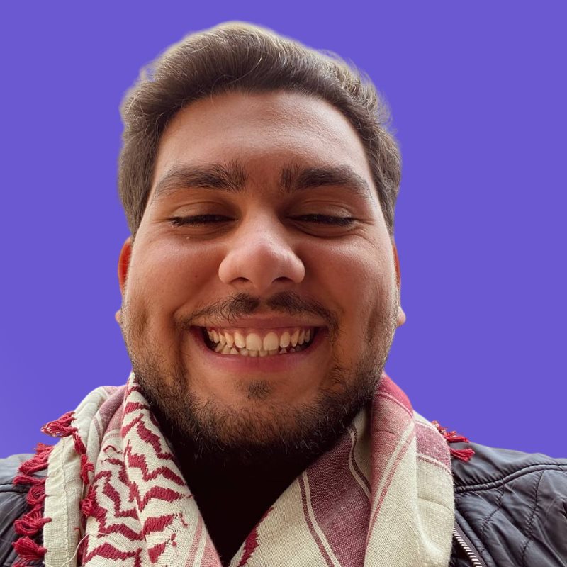 Hamza Khlaf smiling in a casual portrait